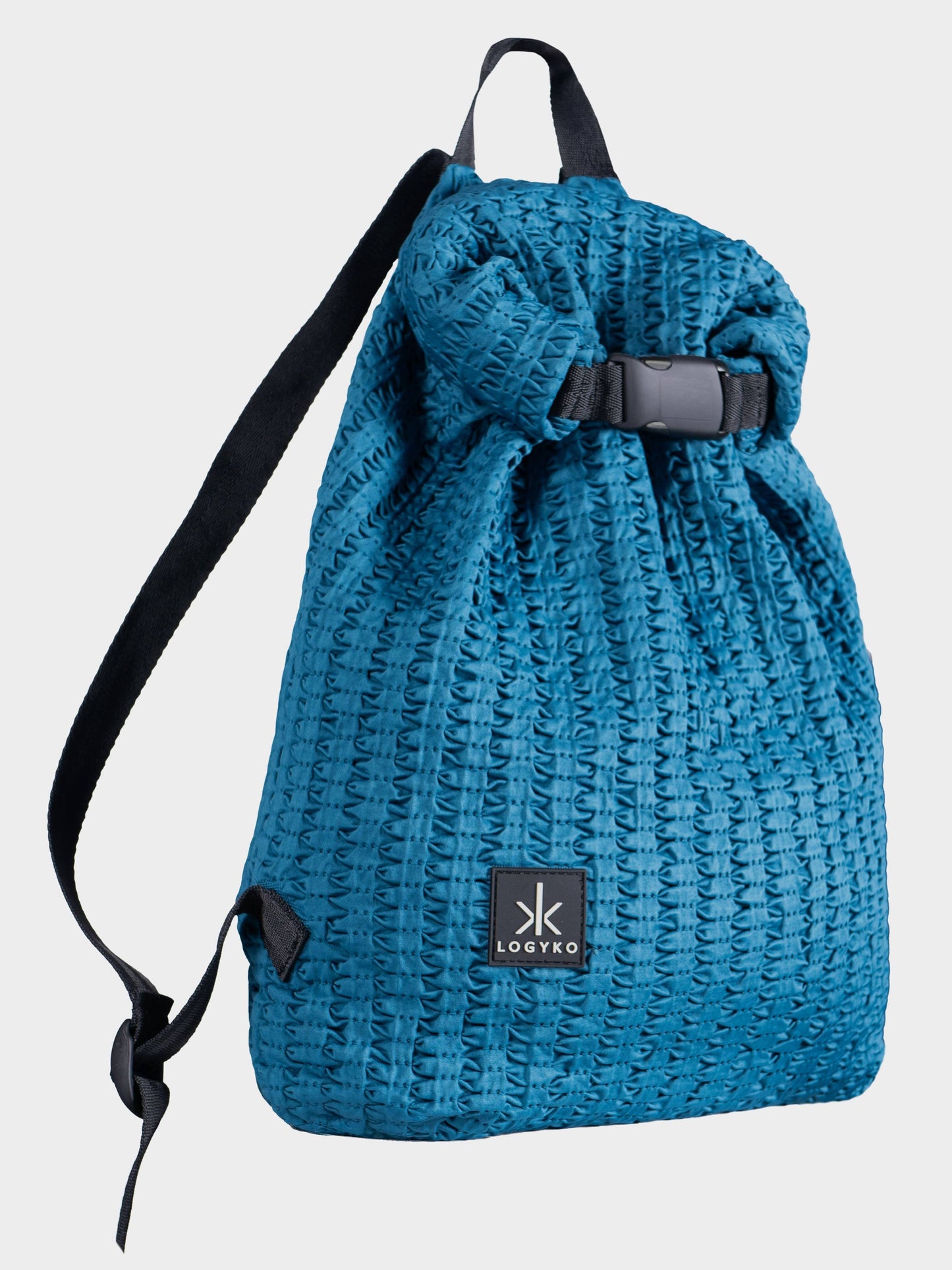 Zaino Helium di LOGYKO color teal visto di lato