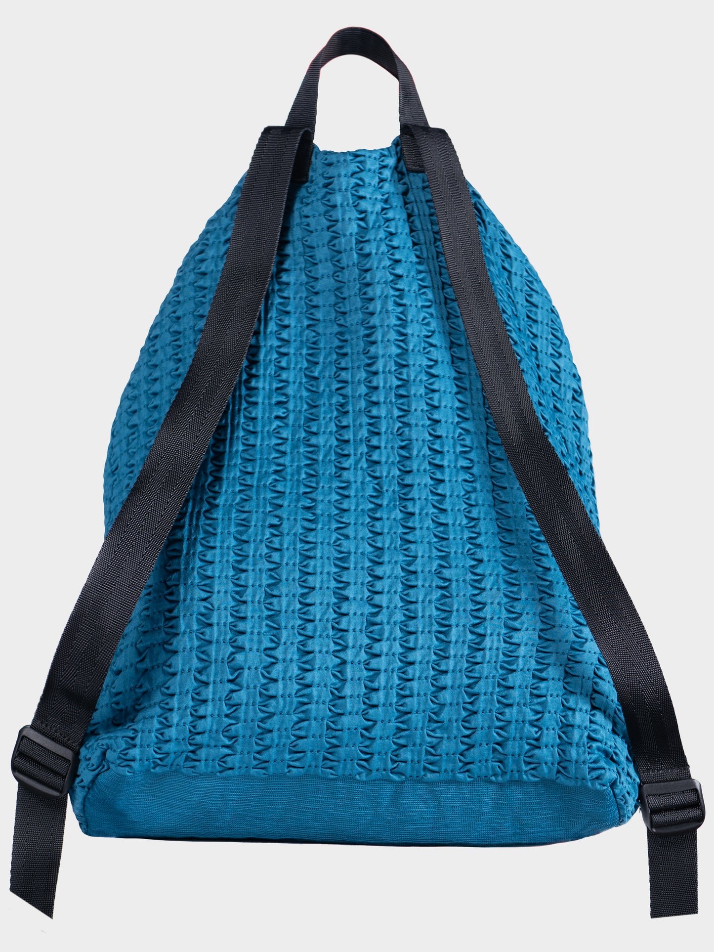 Zaino Helium di LOGYKO color teal visto sul retro